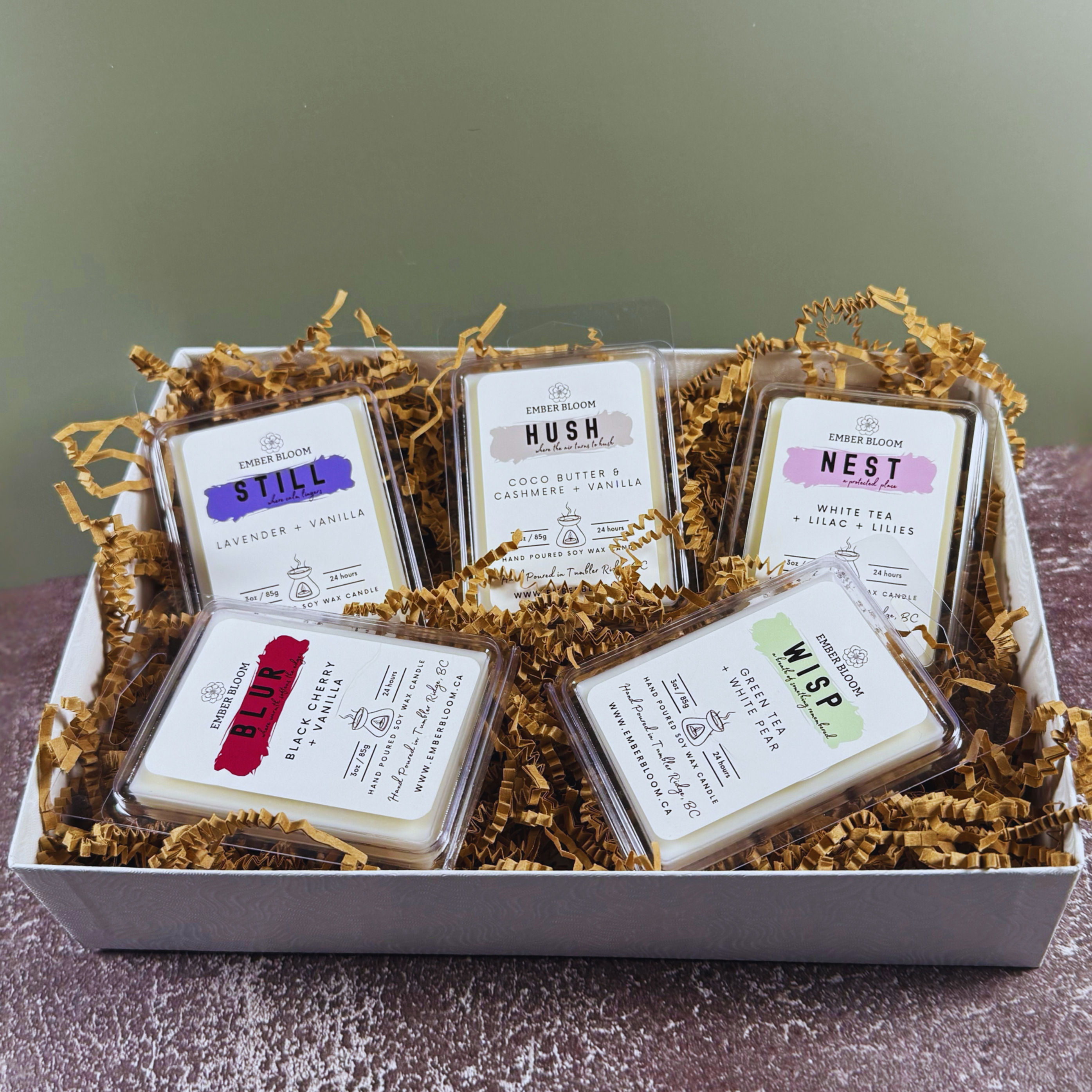 Signature collection soy wax candle gift set packaged with kraft crinkle paper, featuring soft, refined scents, hand-poured