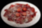 Carpaccio de Cecina de Leon con virutas de queso Manchego