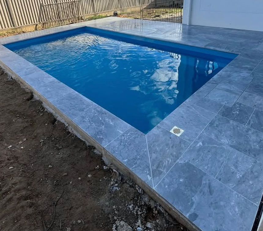 Premium concrete pool with contemporary finishes and integrated outdoor design