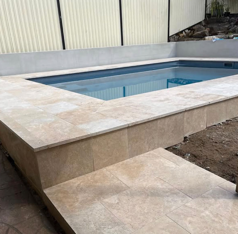 Concrete pool constructed on a sloping residential site with restricted access