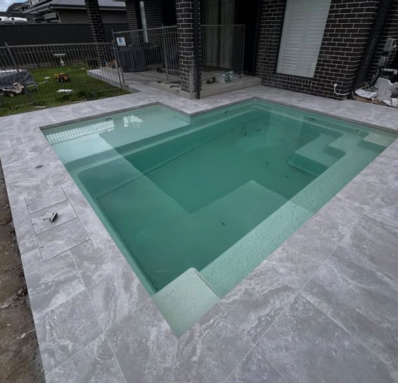 Compact luxury plunge pool ideal for smaller residential backyards