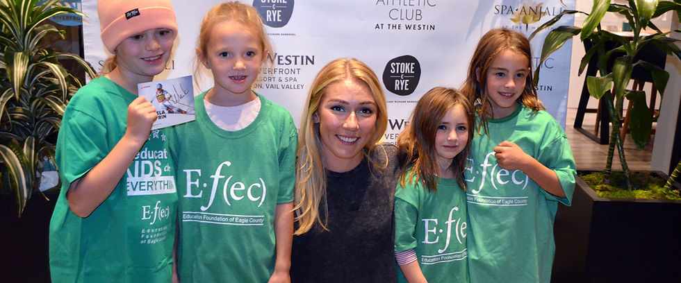 Mikaela Shiffrin with students with Education of Eagle County shirts, at an event in Vail, Colorado.