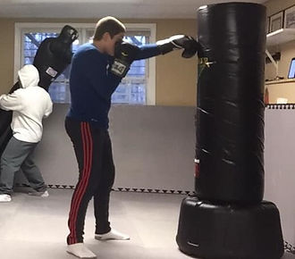Matt on heavy bag.jpg