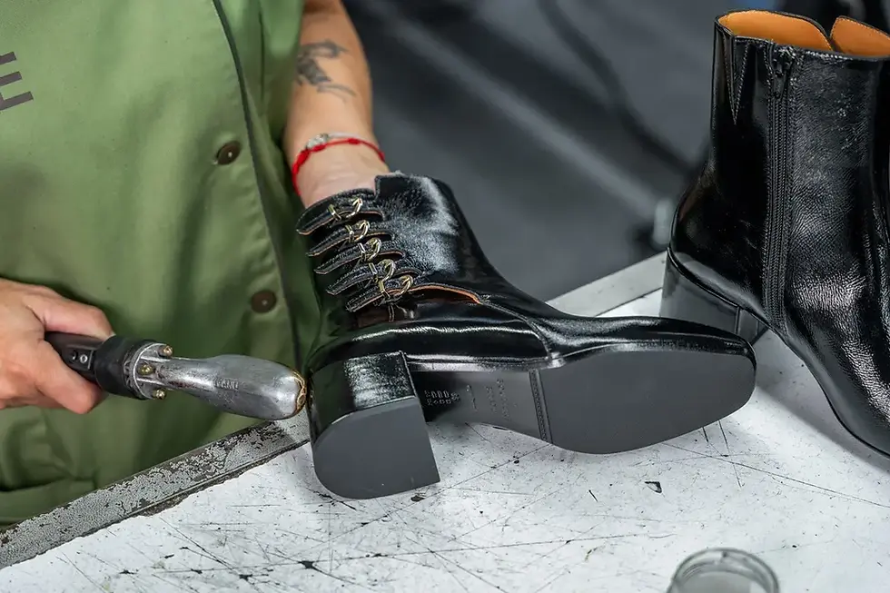 shoe finishing at vise footwear production site in portugal