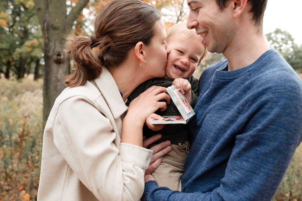 Junction family photographer – candid toddler laughter during High Park photoshoot