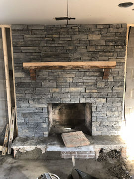 renovated-stone-fireplace-in-Ms-Clark-home