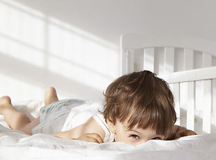 Toddler Peeking Over Bed Quilt2