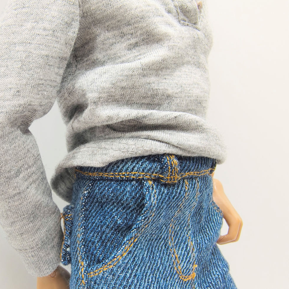 Integrity Toys Homme Male doll in stylish jeans close up view