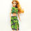Thumbnail: Doll in green outfit Embroidered Doll Couture on white background. gtGdollwear