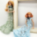 Two Poppy Parker dolls in lace gowns