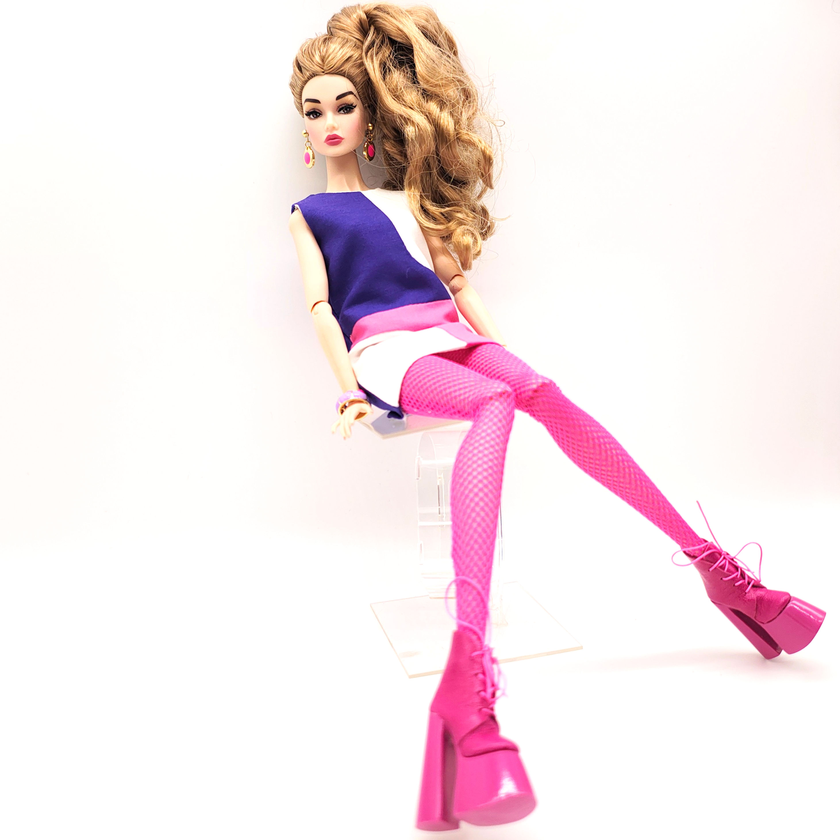 Poppy Parker doll in pink platform shoes with heels