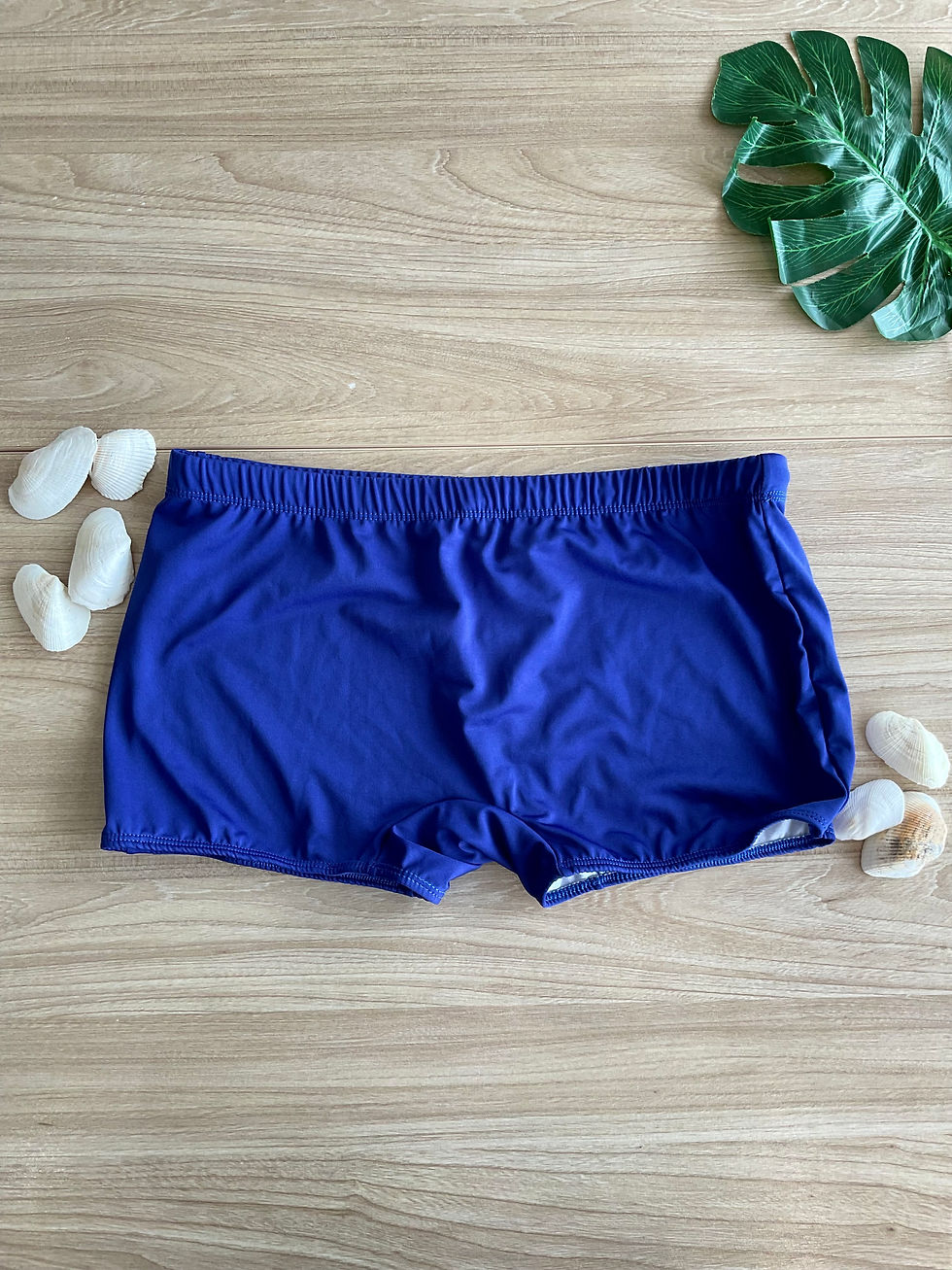 Thumbnail: Brazilian sunga beach boxer in blue. The swimwear features a low-rise waist