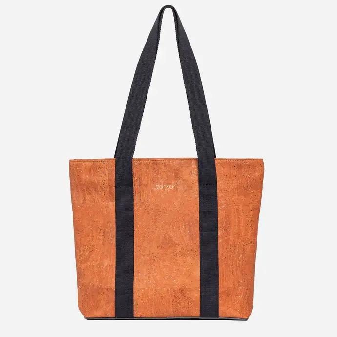 Kamel backpack in vibrant cork, designed for a bold and conscious style in a compact size.