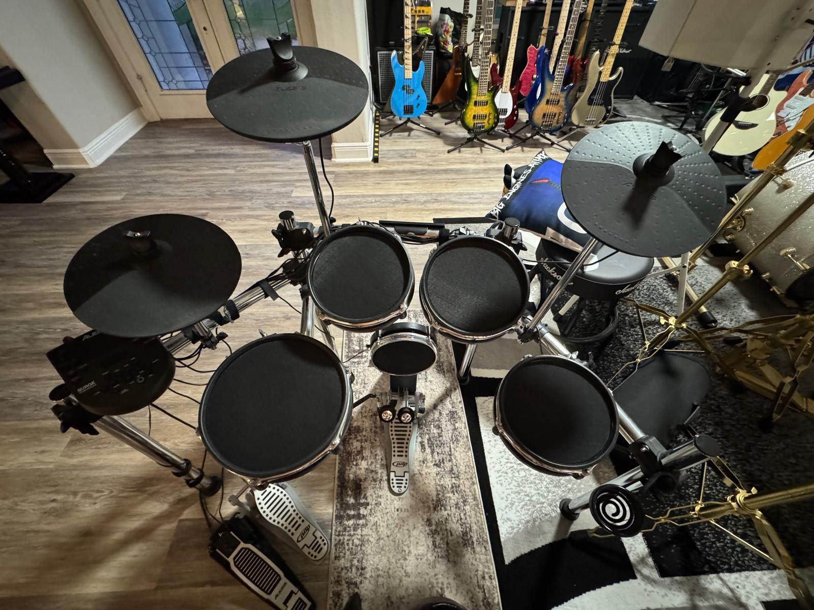 Alesis 5-piece electric drums. W/double pedal. Drum throne.