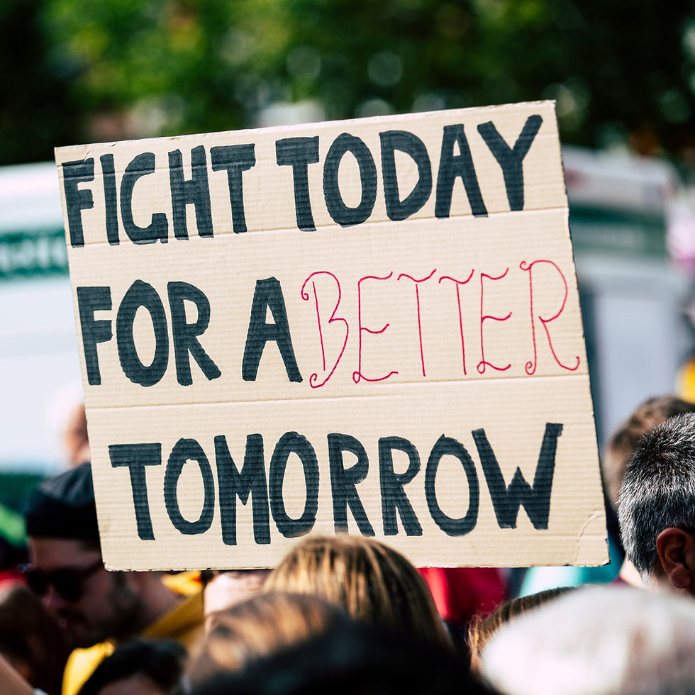 image of a homemade protest sign stating fight today for a better tomorrow.