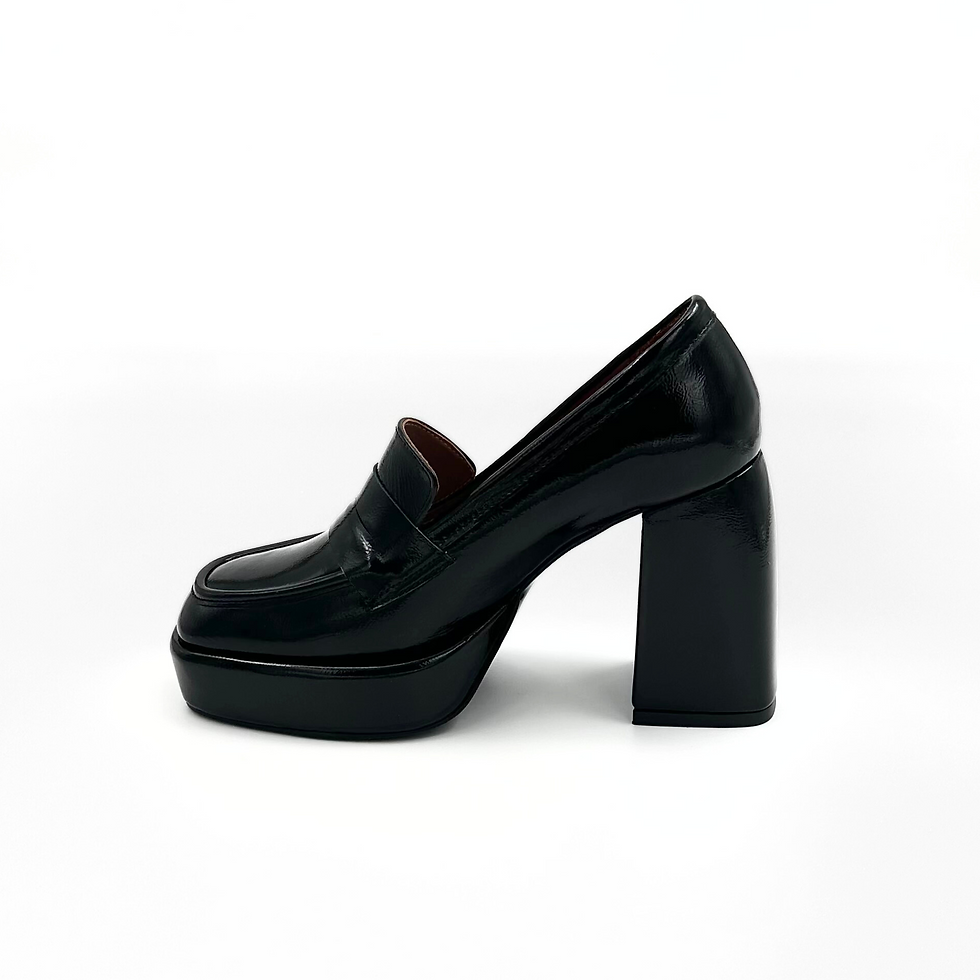 Women’s black patent leather loafer with high heel