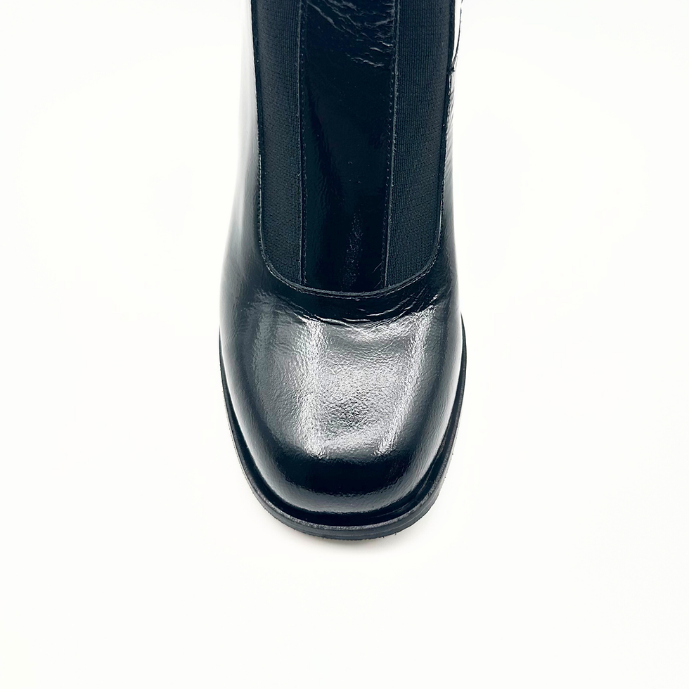 サムネイル： Elegant black patent women’s ankle boot – three-quarter view