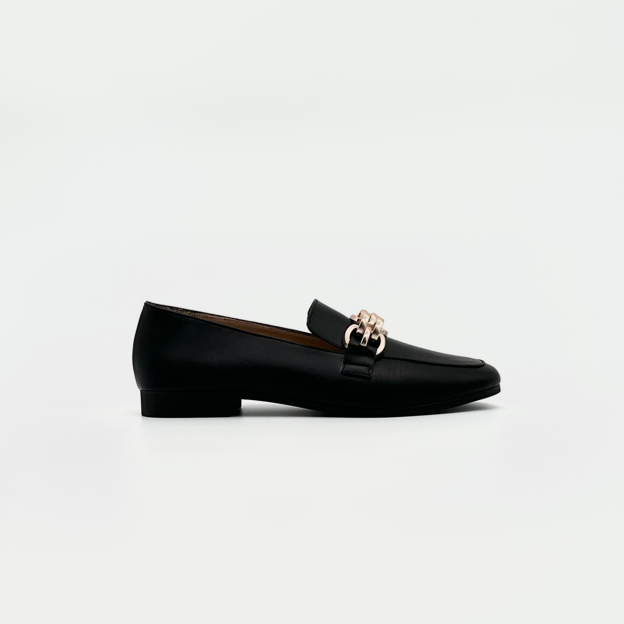 Black leather loafer with gold chain detail – side view