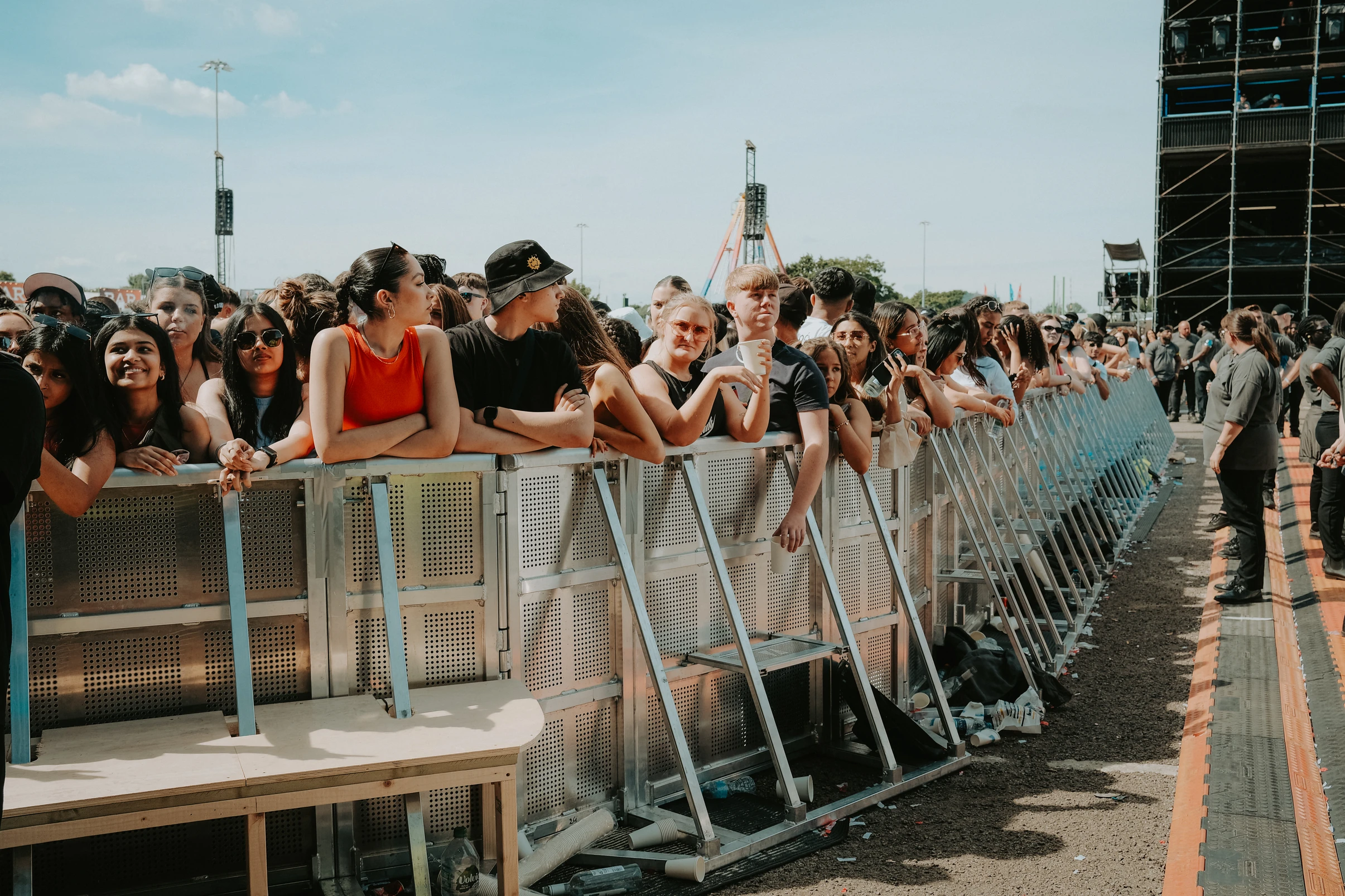 People behind barricades at festival