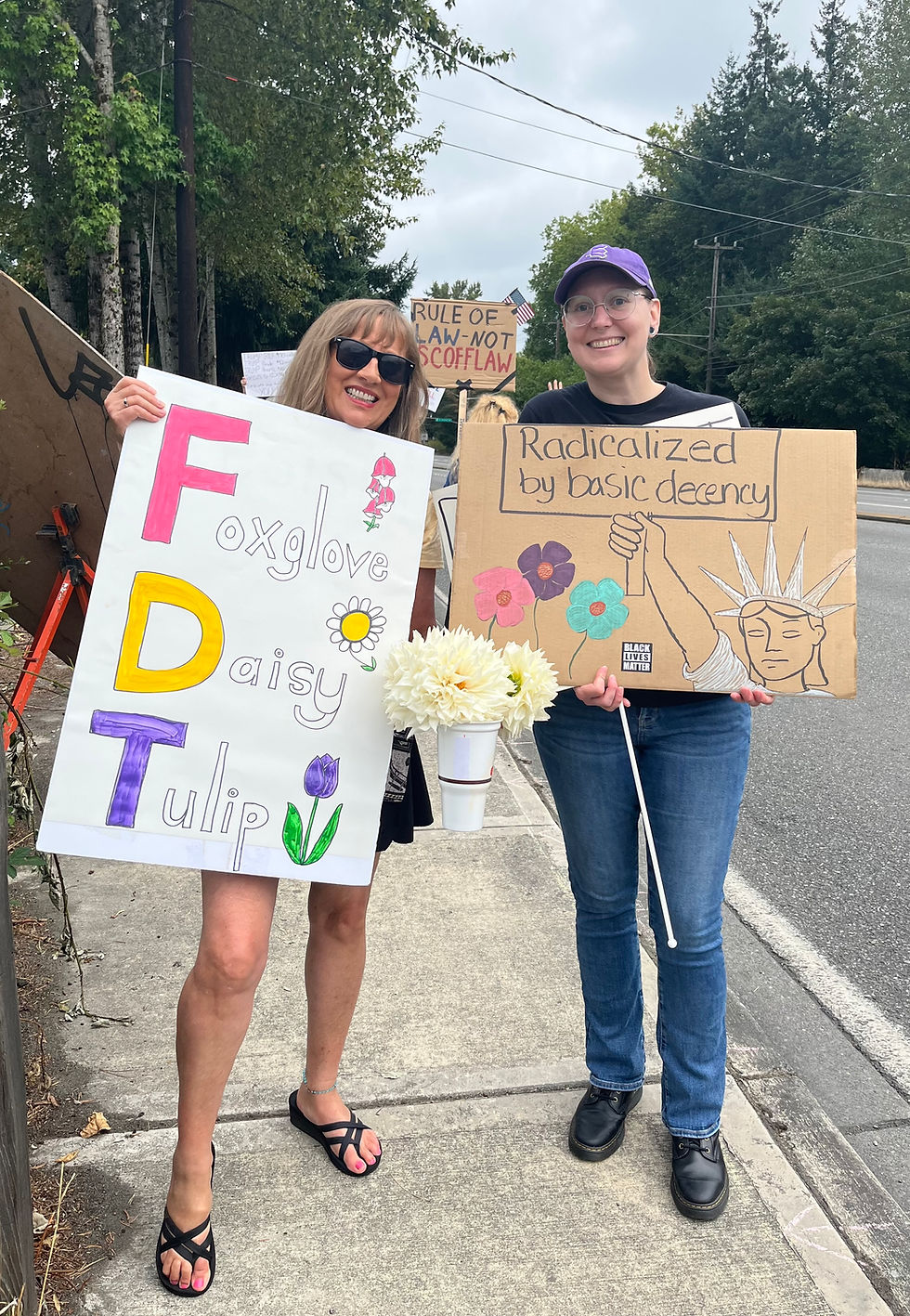 Attended my 8th "Music Festival" (aka protest) on Labor Day with a flower-themed sign and some dahlias from my garden to give to fellow patriots like this wonderful woman. Joy is resistance, and so is art! Thank you to everyone who is taking action in defense of democracy!