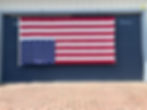 A sign of distress hanging on my neighbor's garage door