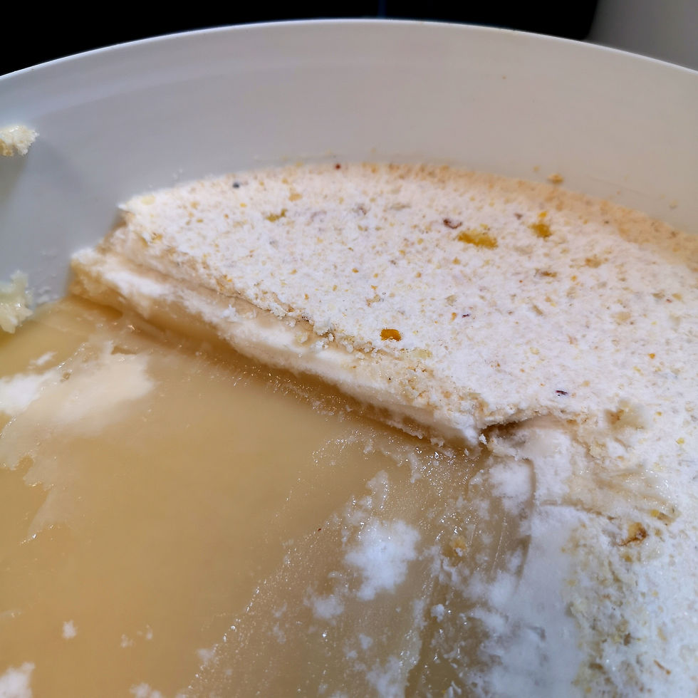 Set honey in a bucket prior to processing into soft set honey using the Dyce method