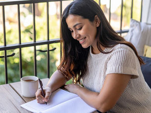 Person attending an outpatient alcohol rehab session online from home