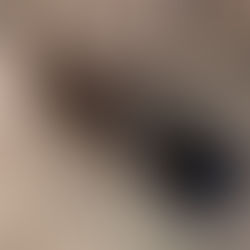 A hammer smashing a smartphone on a concrete surface - symbolising breaking free from tech overuse.