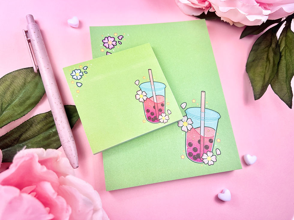 Gift set with green notepad and sticky note featuring milk tea and cherry blossoms, 5.5 x 4.25 and 3 x 3 inch pads