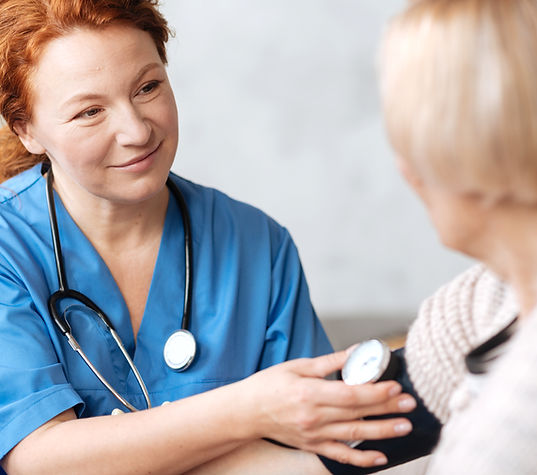 Nurse checking blood pressure_edited.jpg