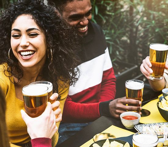 multiethnic-friends-enjoying-happy-hour-drinking-beer-brewery-pub.jpg