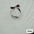 Thumbnail: Trillion cut garnets in modern open silver bypass sterling silver ring
