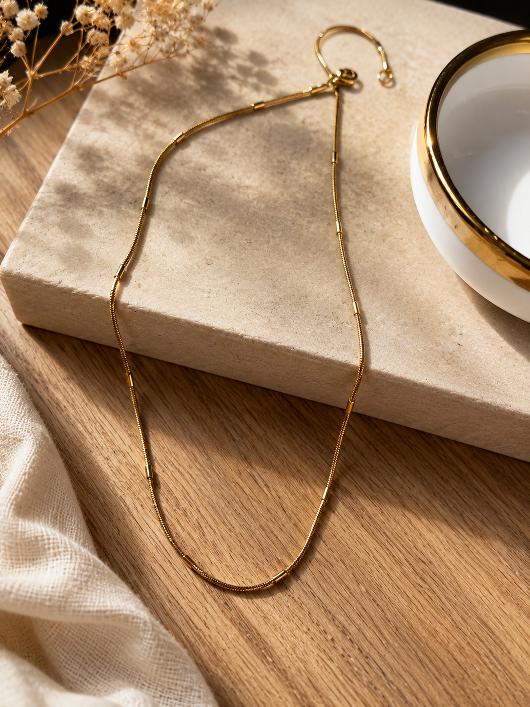 Gold round bar snake chain necklace