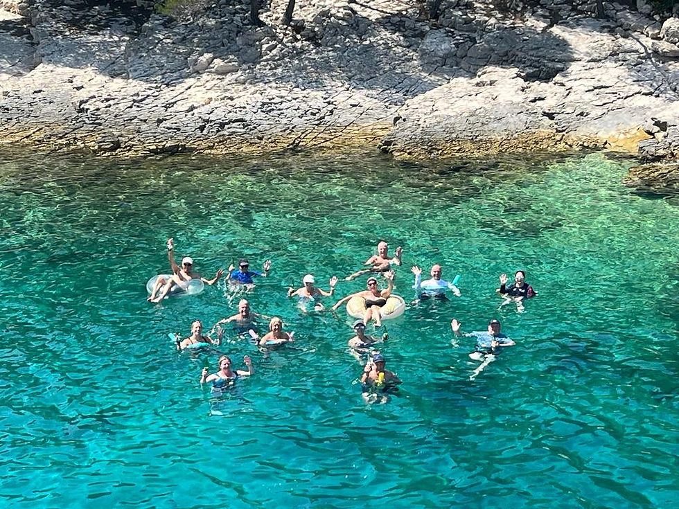 Swimmers on the MV Memories Cruise Ship
