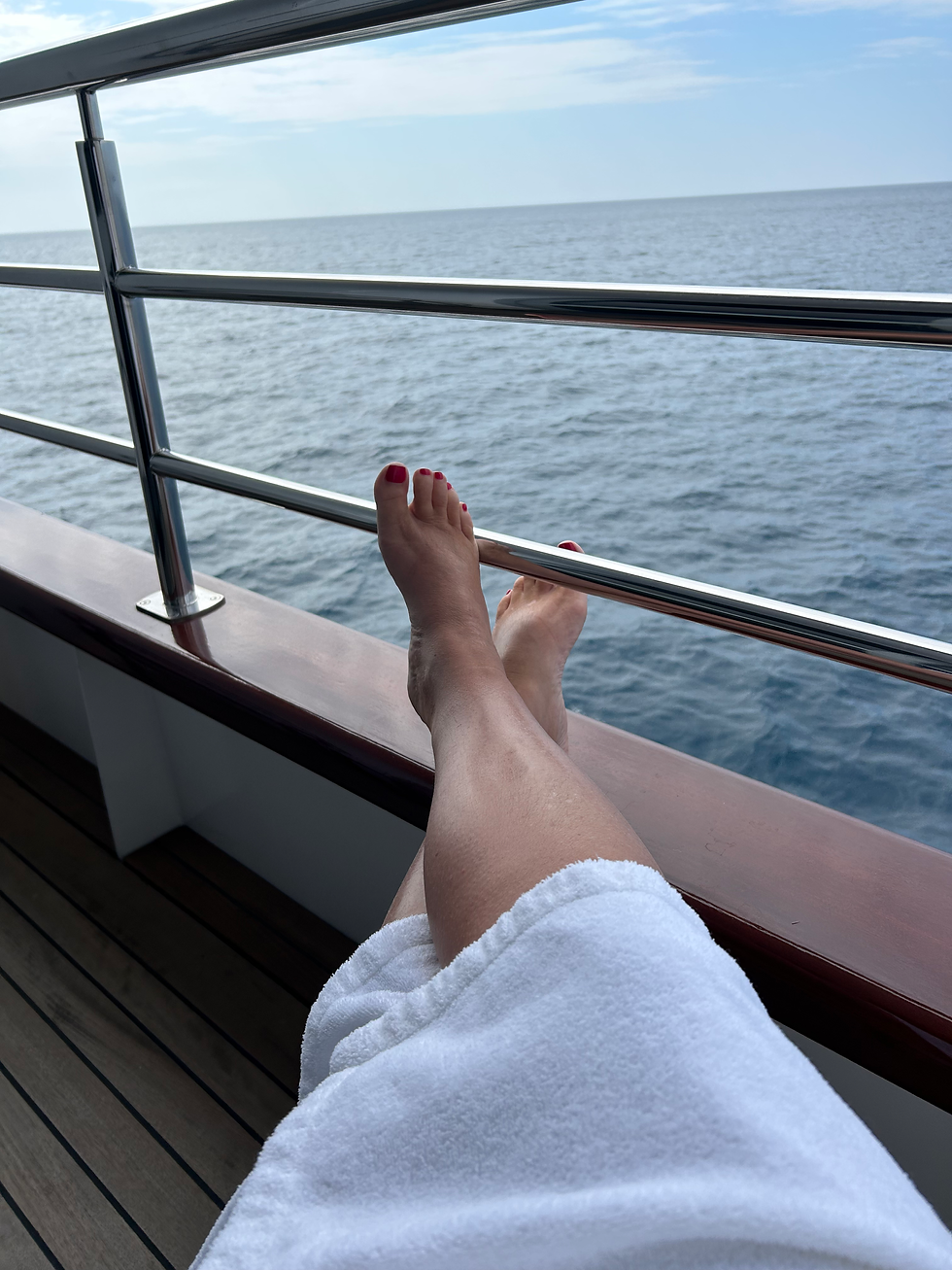 Feet on a balcony