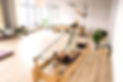 woman-training-pilates-on-the-reformer-bed-reform-2023-04-03-23-23-03-utc_edited.jpg
