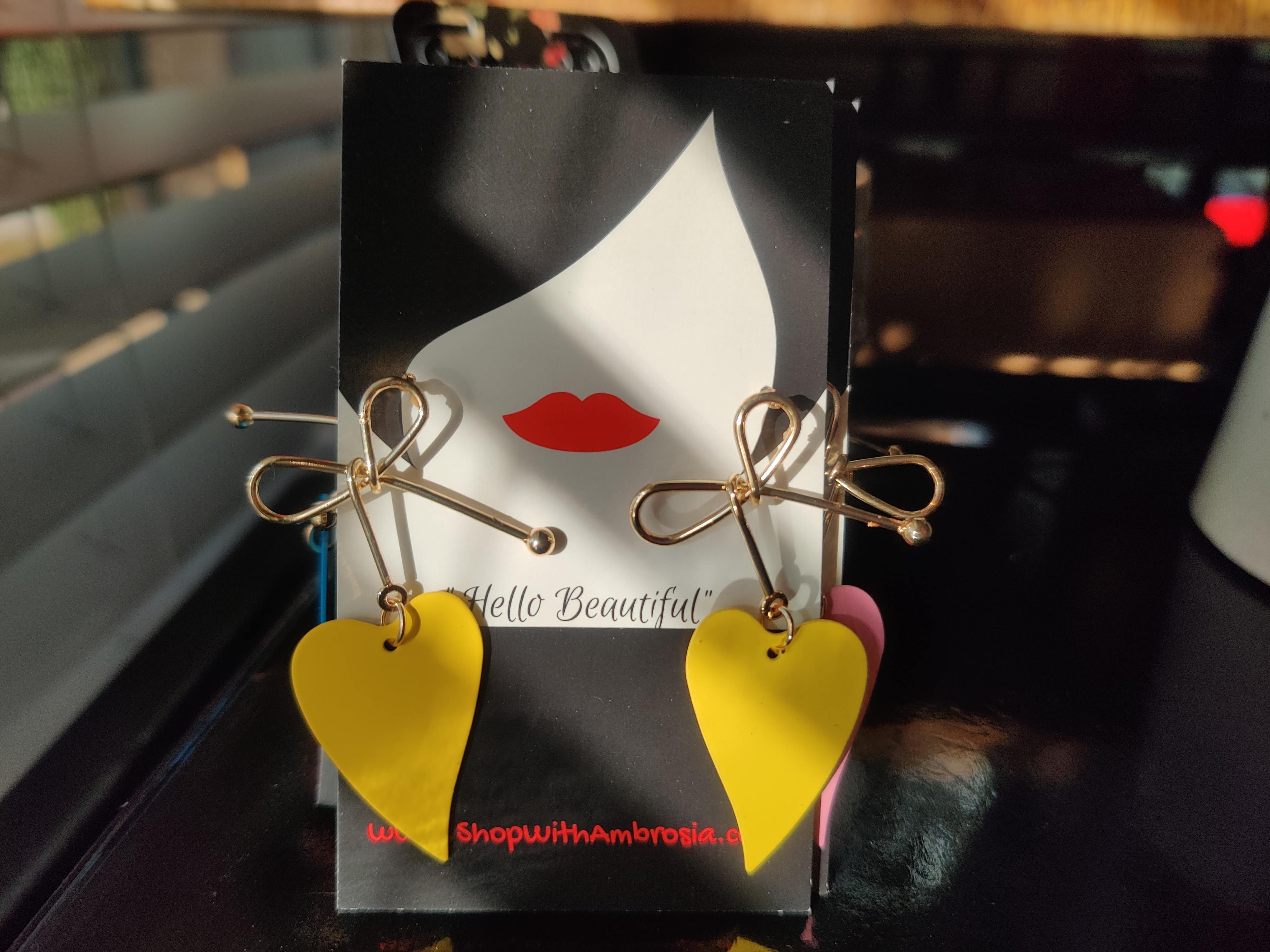 Gold bow and yellow heart earrings
