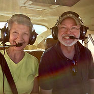 Laurie and Len Buchanan flying