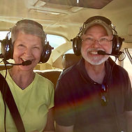 Laurie and Len Buchanan flying