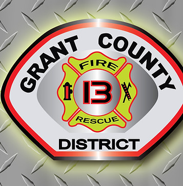 GCFD 13 patch on diamond plate background with yellow glow around it