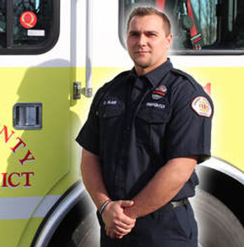 Captain Dakota Blair in front of engine 1311.