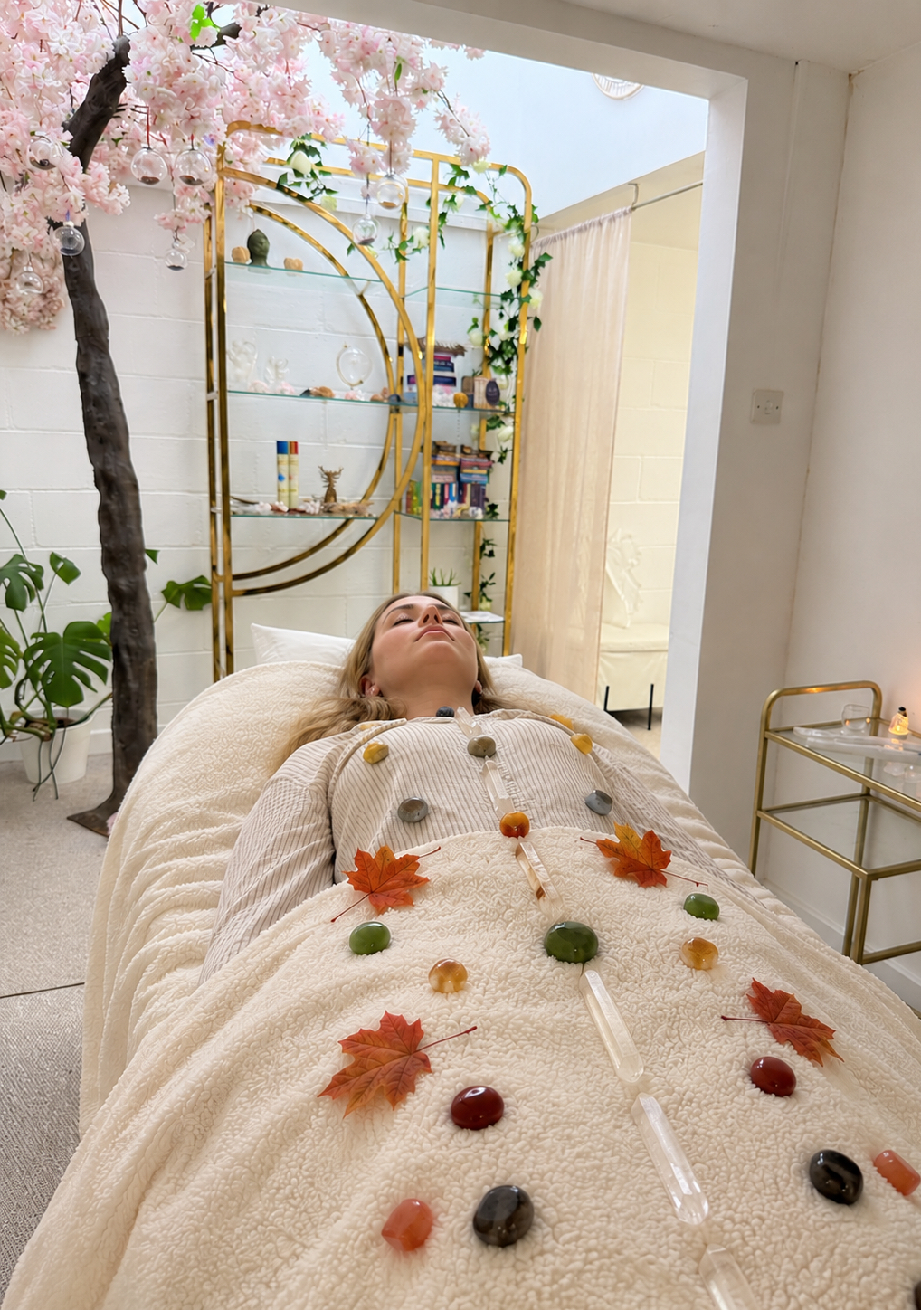 A tranquil healing space set up for a personal crystal grid experience.