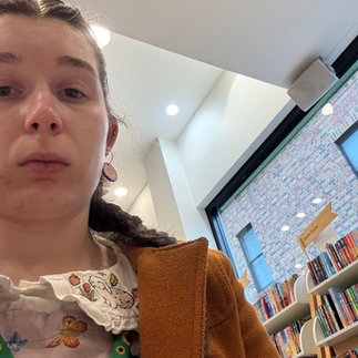 A  selfie of Saffron wearing a forelorn expression.