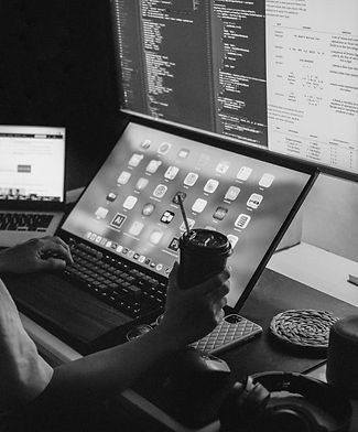 a person sitting in front of a laptop co