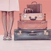 Woman with Suitcases