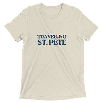 Beige t-shirt with "TRAVELING ST. PETE" printed on the front.