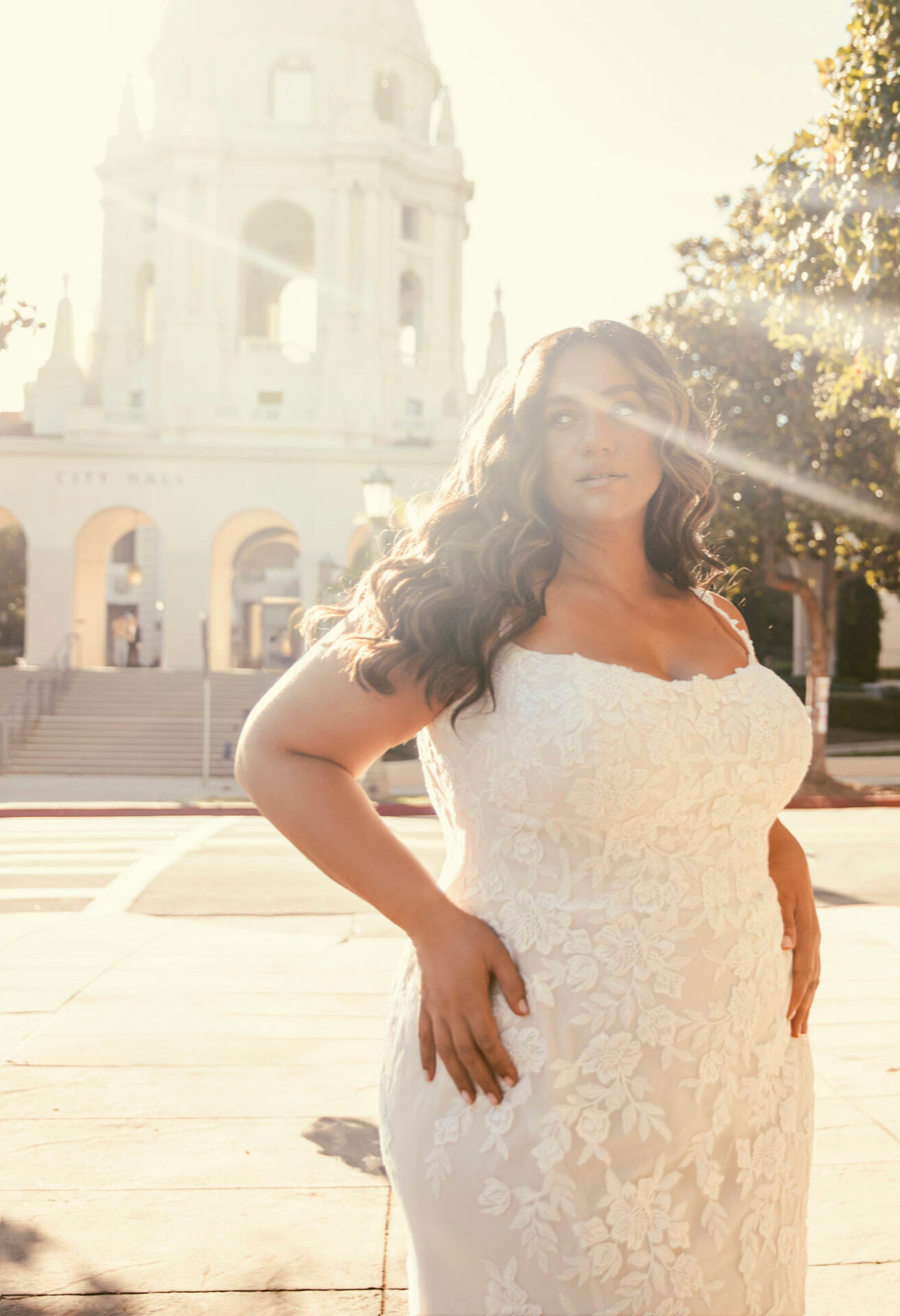tella York 7762 plus-size lace wedding dress, showing botanical appliqué, scoop neckline and curve-flattering fit