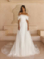 Lissy by Madi Lane off-the-shoulder wedding dress with fitted bodice and flowing skirt, modern minimalist bridal gown