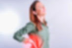 beautiful-young-woman-with-back-pain-lumbar-with-red-area-white-background.jpg
