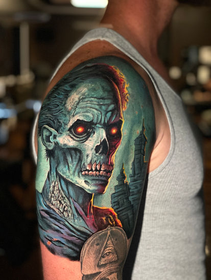 Olexandr Khoroshun color cover up tattoo in Cary NC, large scale tattoos at odyssey art collective